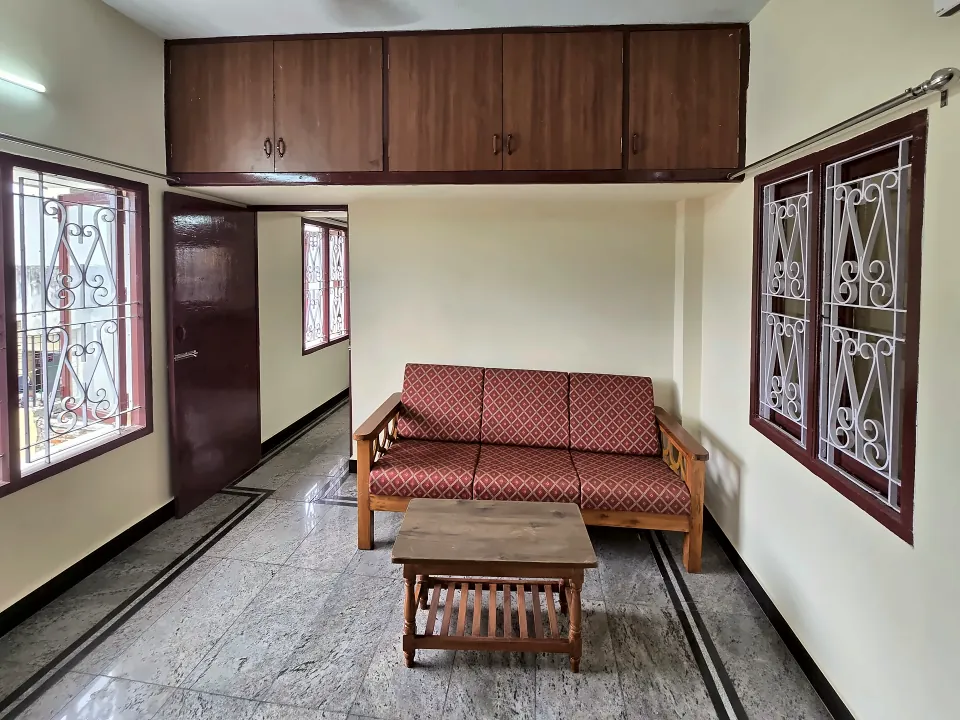 Living room of a 1BHK home (Unit 3A) at Raaj Illam